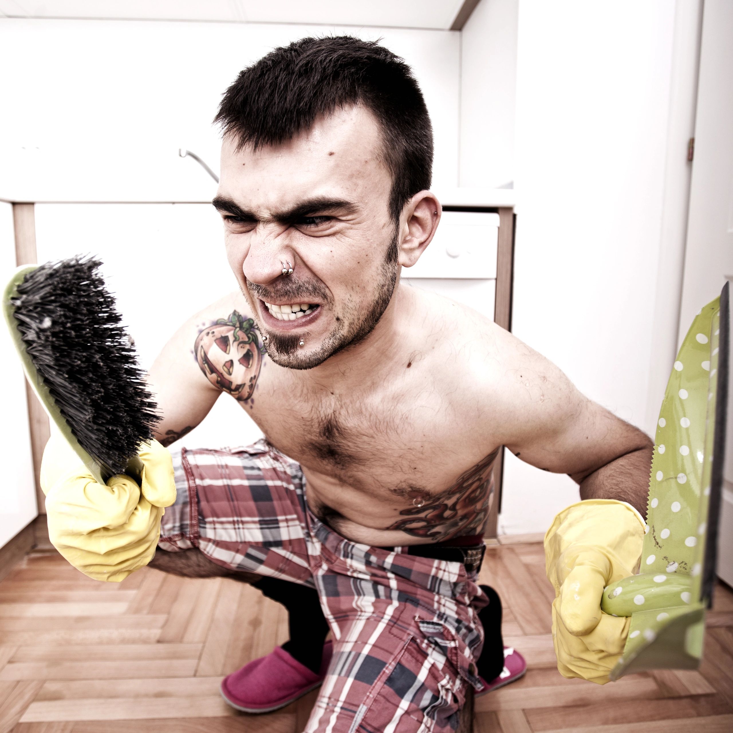Homeowner holding cleaning equipment